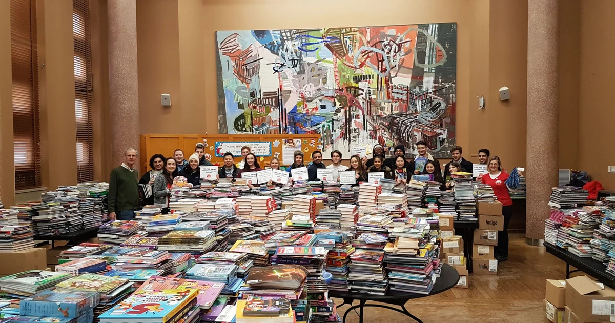 First Book Canada, Pi Beta Phi, and the University of St. Michael's College provide books to kids in need in Toronto